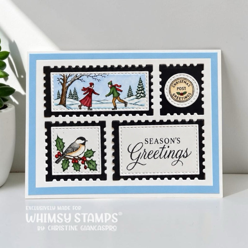Christmas greeting card with a light blue border and four postage-stamp-style panels. The top-left panel shows a winter scene with two people ice skating; the bottom-left panel shows a bird on a holly branch; the bottom-right panel reads “Season’s Greetings” in script; the top-right panel says “Christmas Post Greetings” with a circular stamp motif.