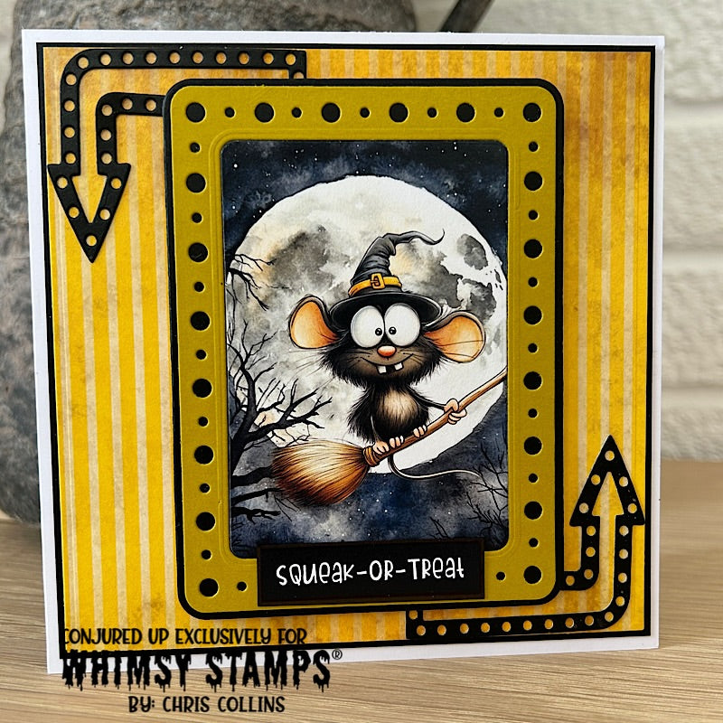 A handmade Halloween card featuring a cartoon mouse wearing a witch hat and riding a broomstick in front of a full moon. The card has a yellow striped border, a black dotted inner frame, and the text 'Squeak-Or-Treat' at the bottom.