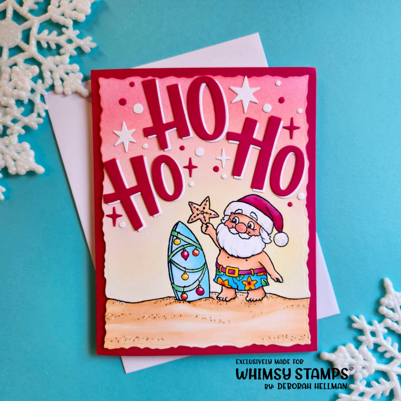 A handmade Christmas greeting card featuring a cartoon Santa Claus dressed for surfing with a decorated surfboard,  layered 'Ho Ho Ho' text. The card is styled on a turquoise background with white snowflake decorations and a white envelope.