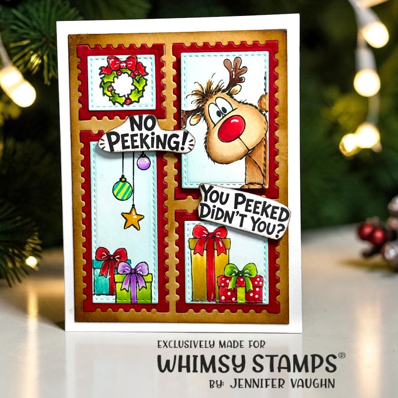 Christmas greeting card featuring a cartoon reindeer peeking out, with gift boxes, and holiday decorations. 