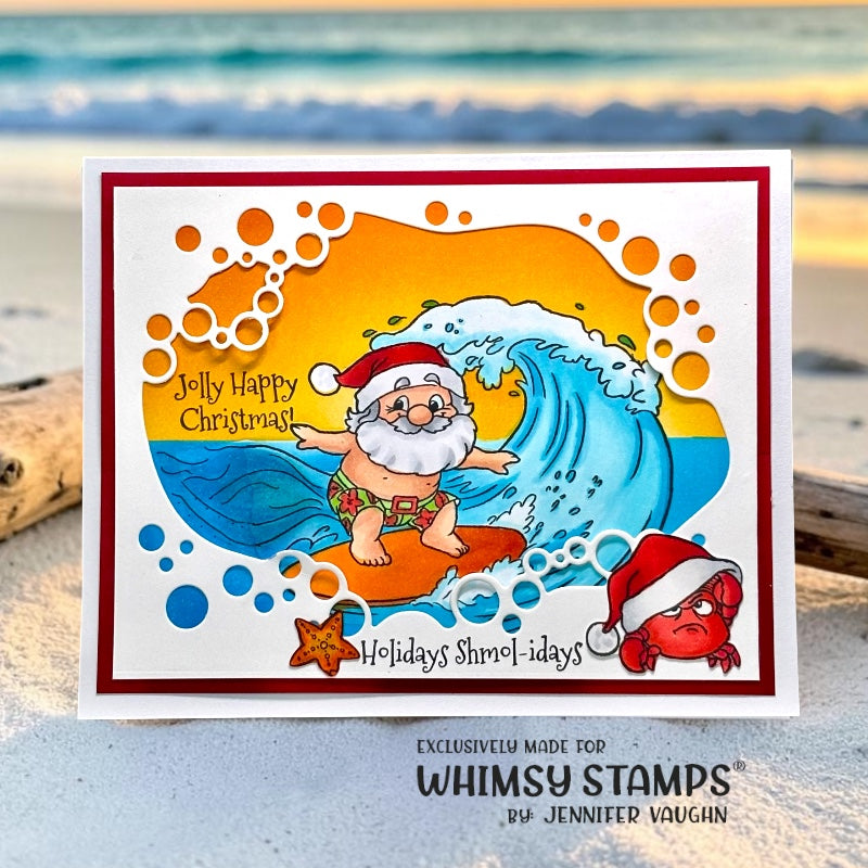 A handmade holiday greeting card featuring a cartoon Santa Claus surfing on an orange board amidst blue waves, with the text 'Jolly Happy Christmas!' and 'Holidays Shmol-days' and a grumpy crab image accent.