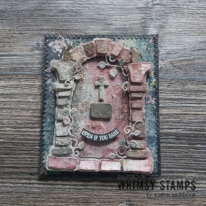 A handmade layered tombstone card featuring a distressed, weathered brick design with a cross, an 'R.I.P.' sign, and the sentiment 'Open If You Dare'.