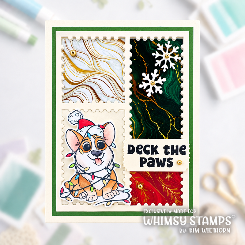 A handmade greeting card featuring four postage-stamp-style panels with a corgi wearing a Santa hat, gold marbled swirls, white snowflakes on dark green, and red festive stamp designs. 
